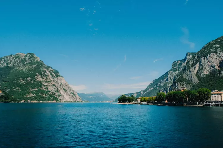 Serene Lake Como as seen from the shores of Lecco