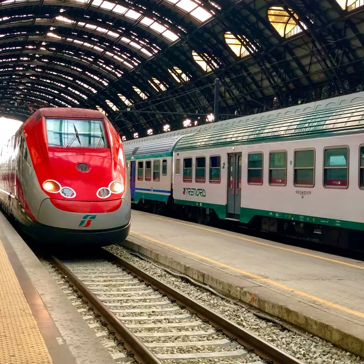 Trenitalia and Trenord trains at Milan train station